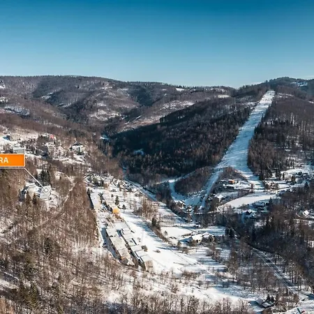 Barbara Ustron, Sun & Snow Apartman *